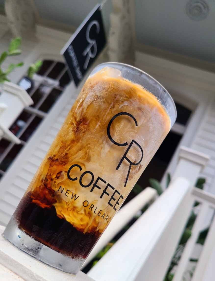 Iced coffee beverage in CR Coffee cup