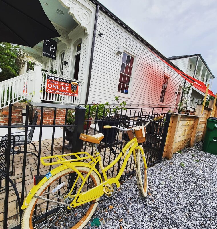 CR Coffee Magazine Street flagship exterior with bicycle