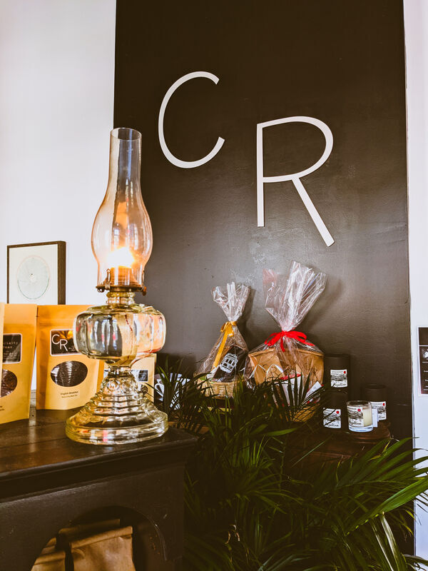 Coast Roast coffee products on mantel